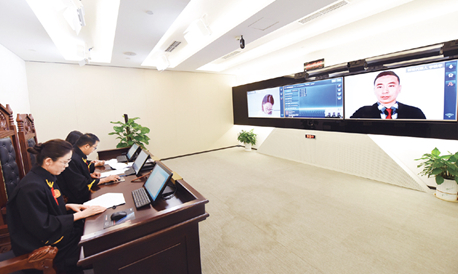 沿着中国特色社会主义法治道路奋勇前进