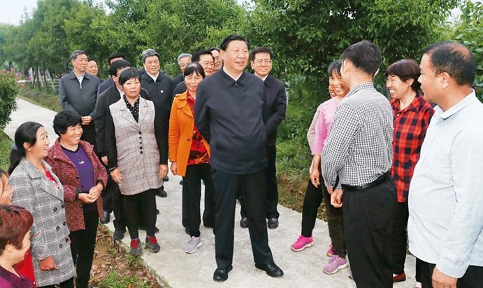 习近平：扎实推动共同富裕