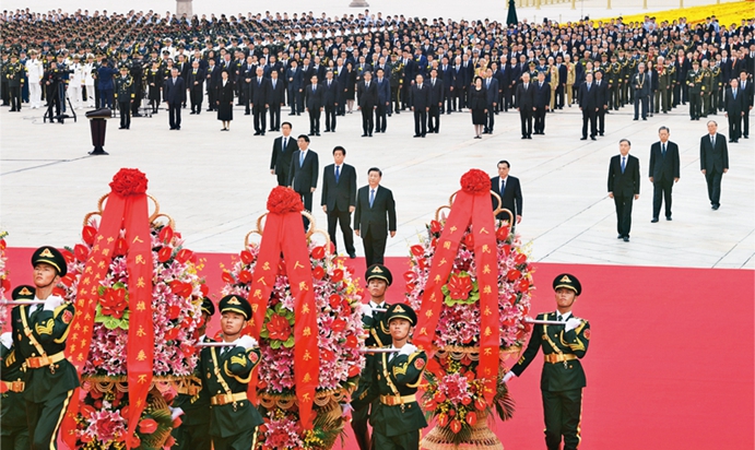 习近平：坚定理想信念 补足精神之钙